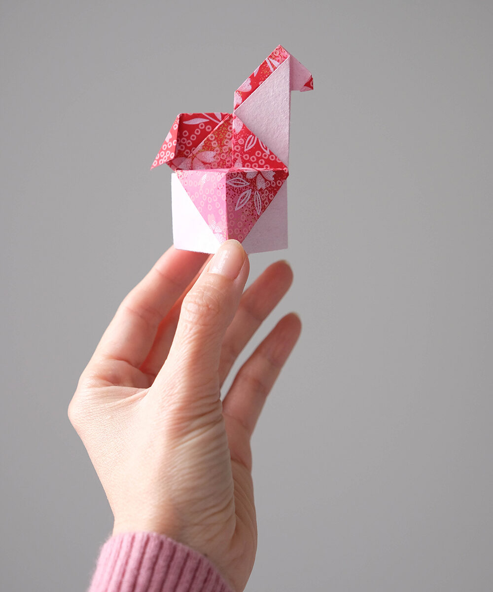 Woman had holding an Origami Horse Gift Box